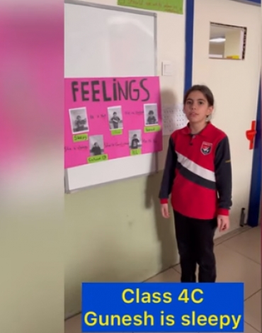 Students from class 4C , are presenting their posters about feelings, all the posters have been prepared by them and about themselves.