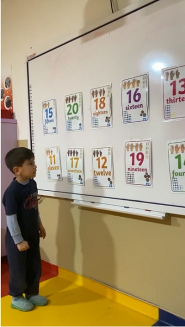 We are learning numbers with our 5 age students